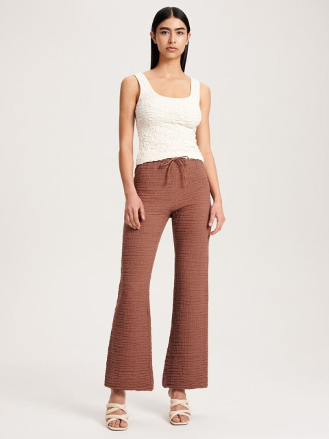 Mušelínové kalhoty